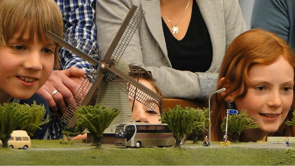 Children looking at a windmill in the miniature world